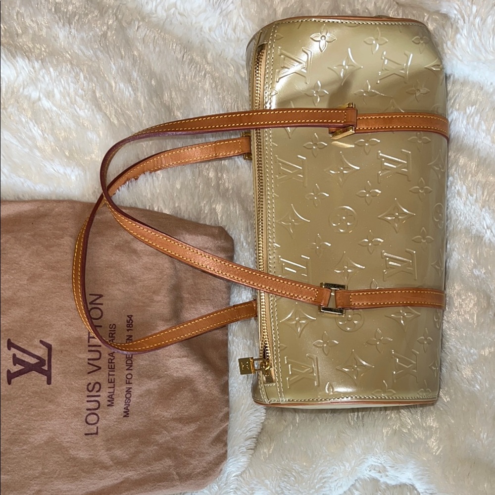 This is an Louis Vuitton Tan Shoulder Bag with Monogram Pattern